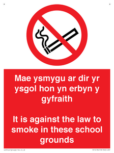 Mae ysmygu ar dir yr ysgol hon yn erbyn y gyfraith It is against the law to smoke in these school grounds - Bilingual Welsh / English
